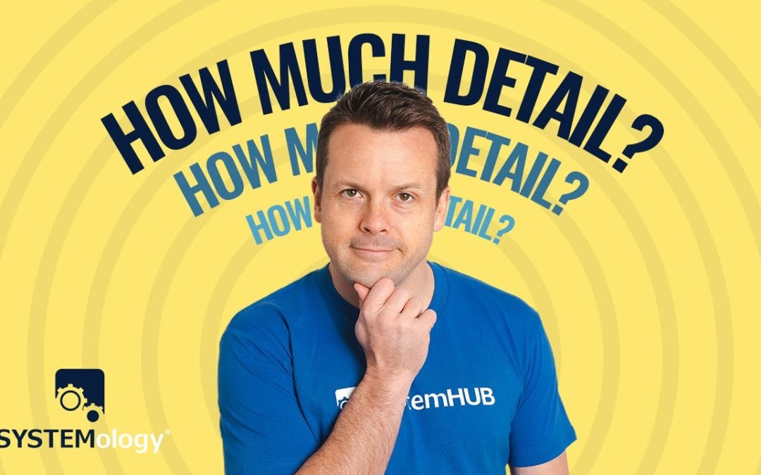 David Jenyns in a blue SystemHUB t-shirt pondering 'How Much Detail?' against a yellow SYSTEMology branded background