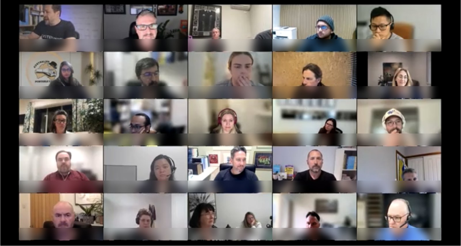 The live mastermind room, business owners on screen during a session, names blurred for privacy